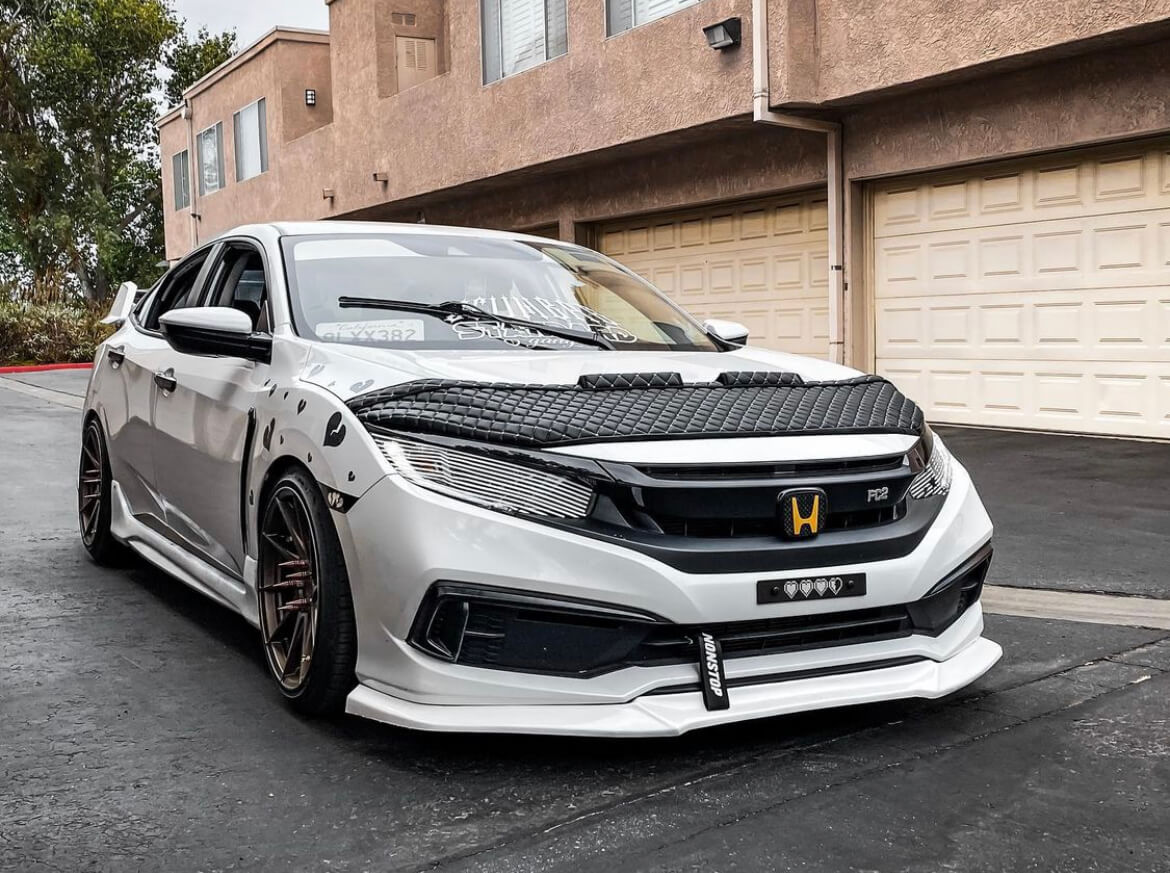Unpainted glossy plastic GT Style front bumper lip (5)