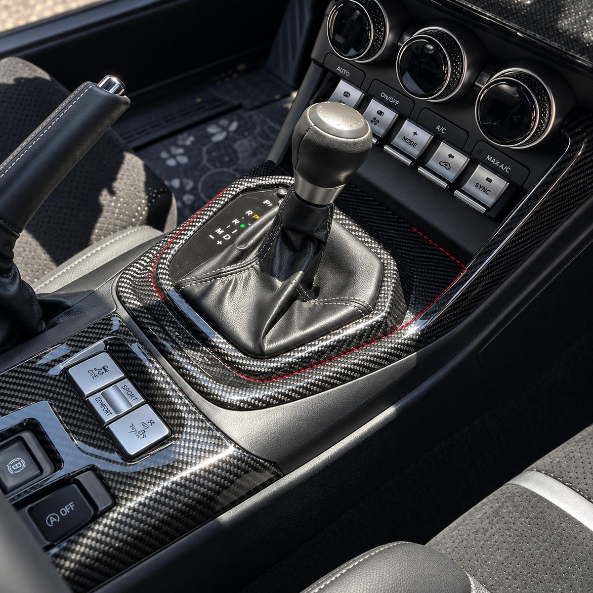 Carbon fiber shift console panel trim installed in Toyota GR86 interior (2)