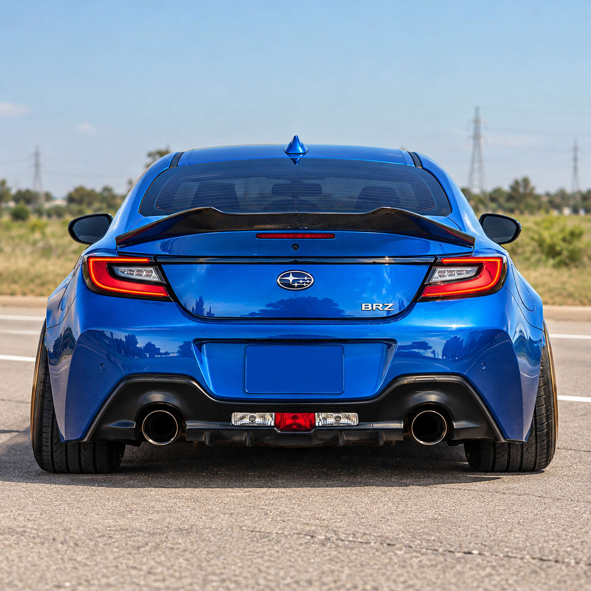 Gloss black V-style trunk spoiler mounted on Toyota GR86 (1)