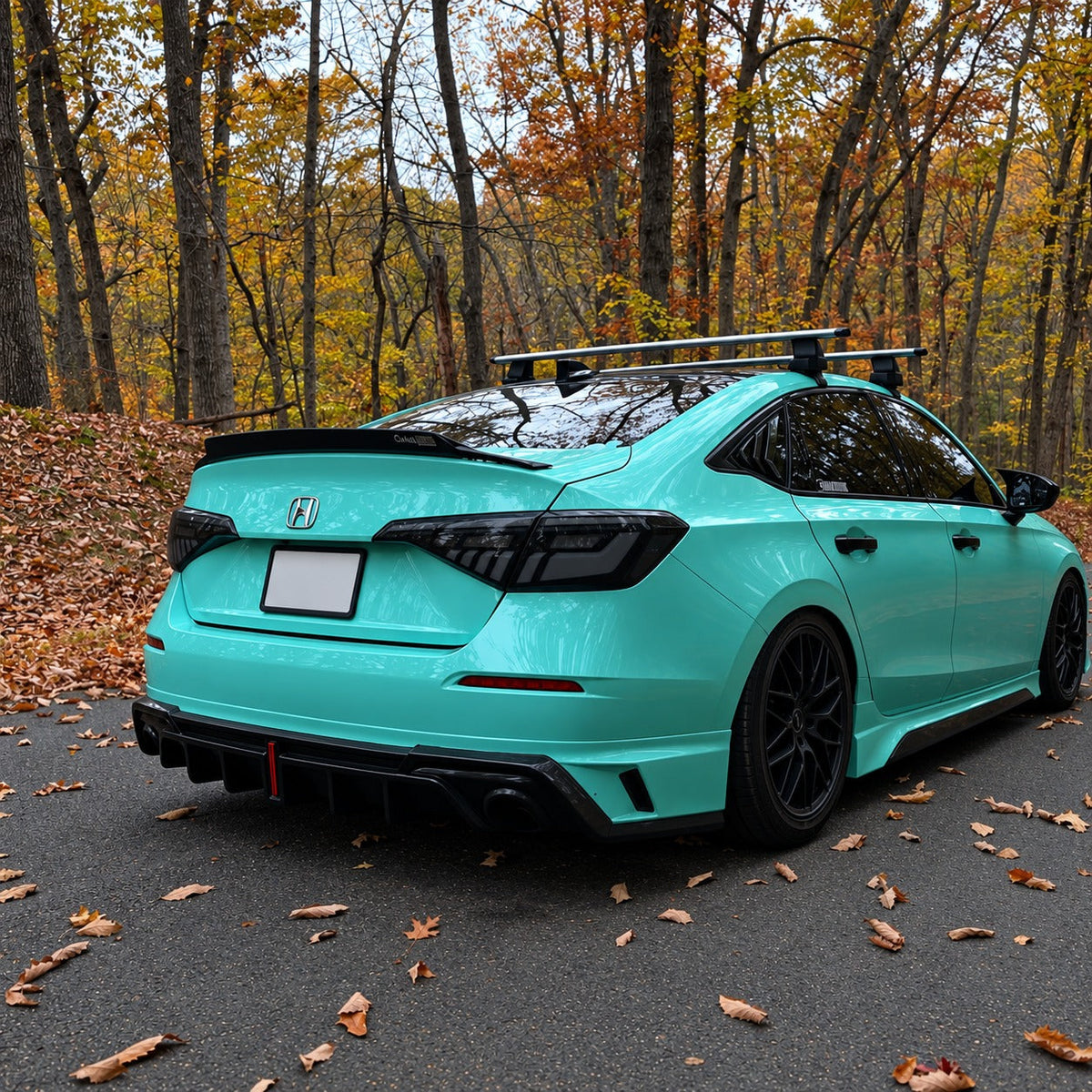 Pair of RGB sequential taillights with red and blue lighting effects installed on Honda Civic sedan (3)