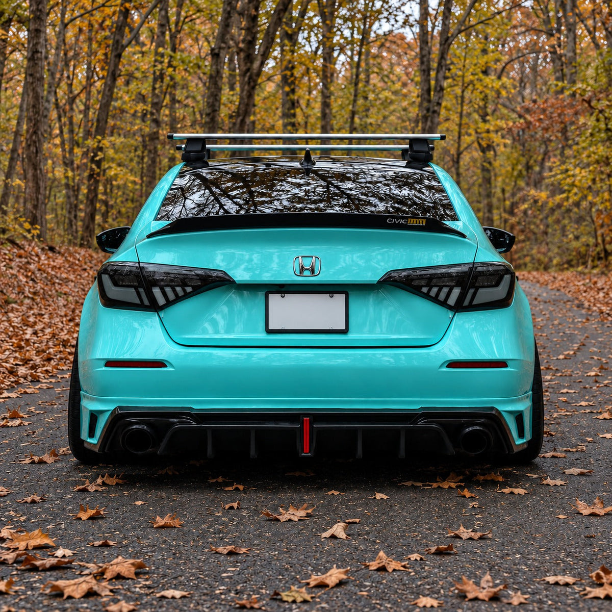 Pair of RGB sequential taillights with red and blue lighting effects installed on Honda Civic sedan (4)
