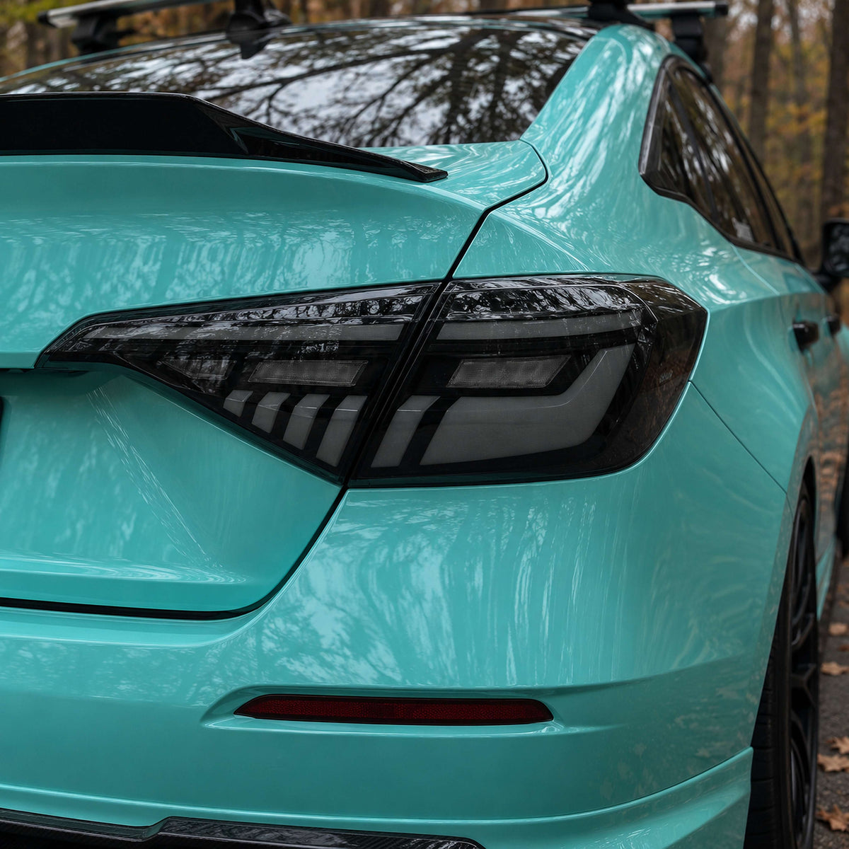 Pair of RGB sequential taillights with red and blue lighting effects installed on Honda Civic sedan (5)