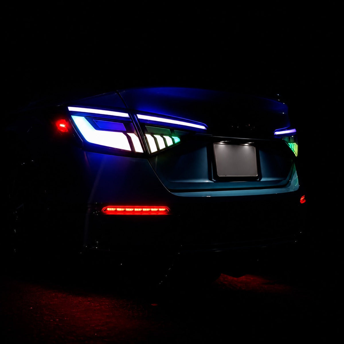 Pair of RGB sequential taillights with red and blue lighting effects installed on Honda Civic sedan (7)