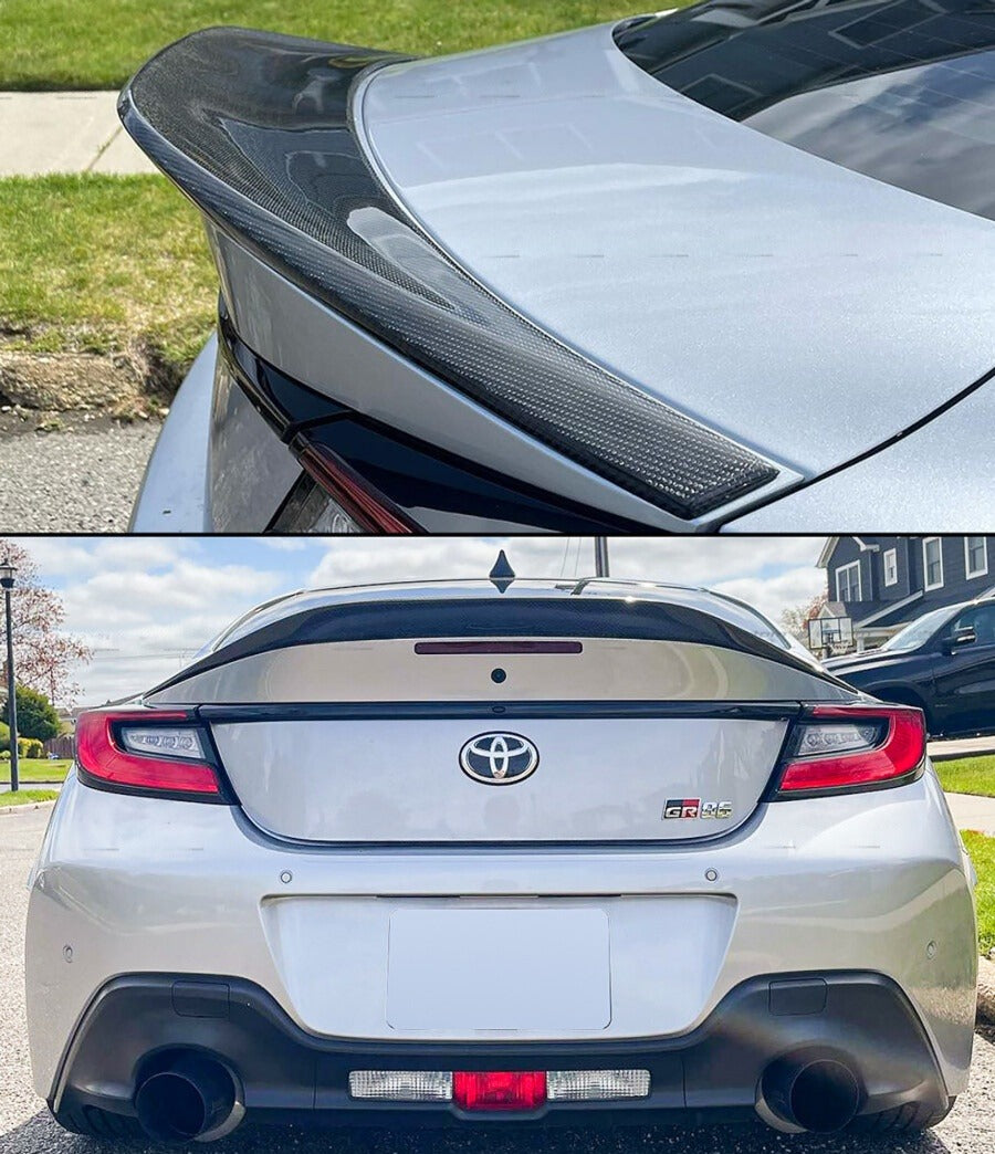 Black carbon fiber duckbill trunk spoiler mounted on white Toyota GR86 (2)