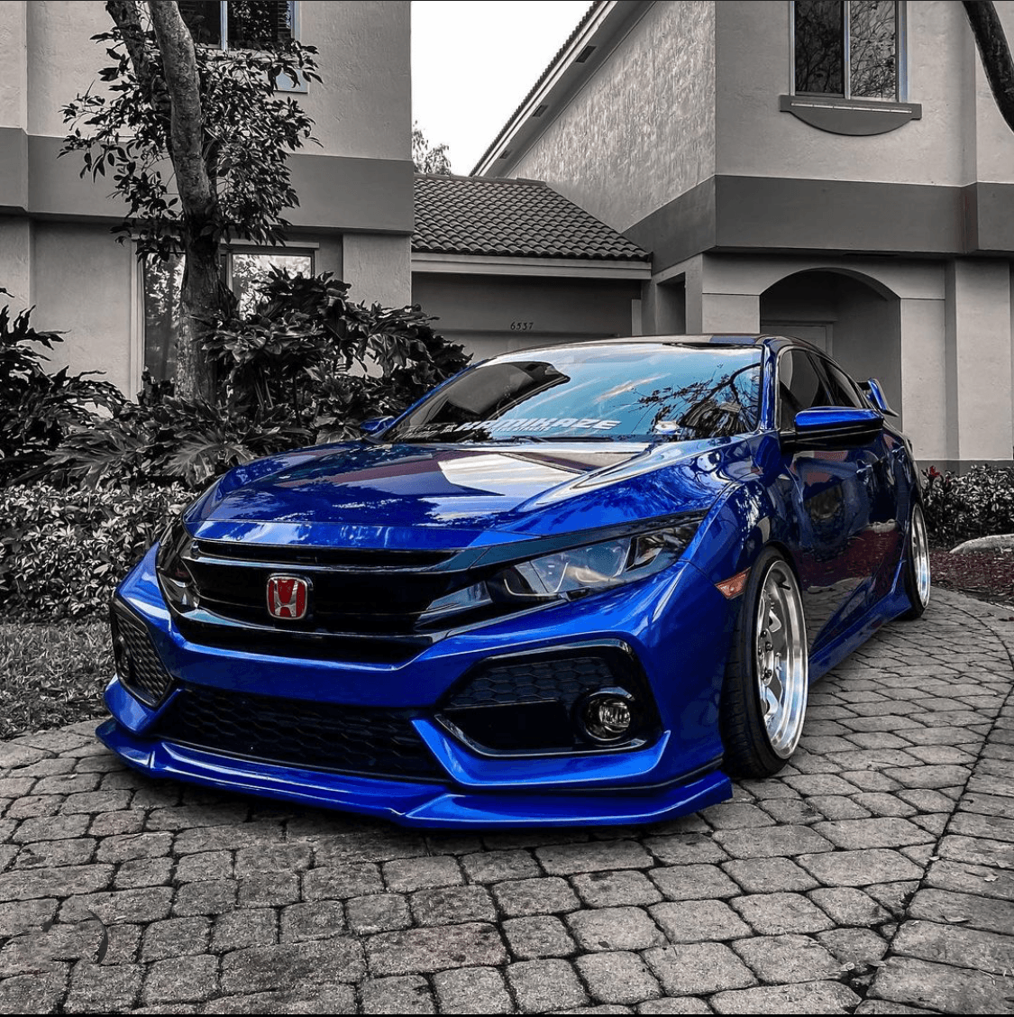 Unpainted glossy plastic GT Style front bumper lip (4)
