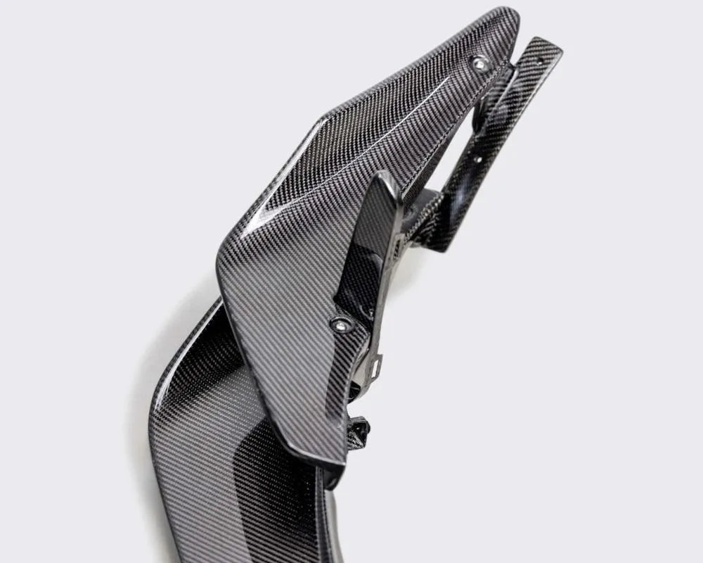Seibon carbon fiber front bumper canards installed on Honda Civic, showing gloss finish detail (4)