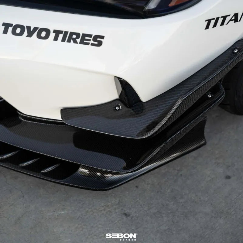 Seibon carbon fiber front bumper canards installed on Honda Civic, showing gloss finish detail (7)