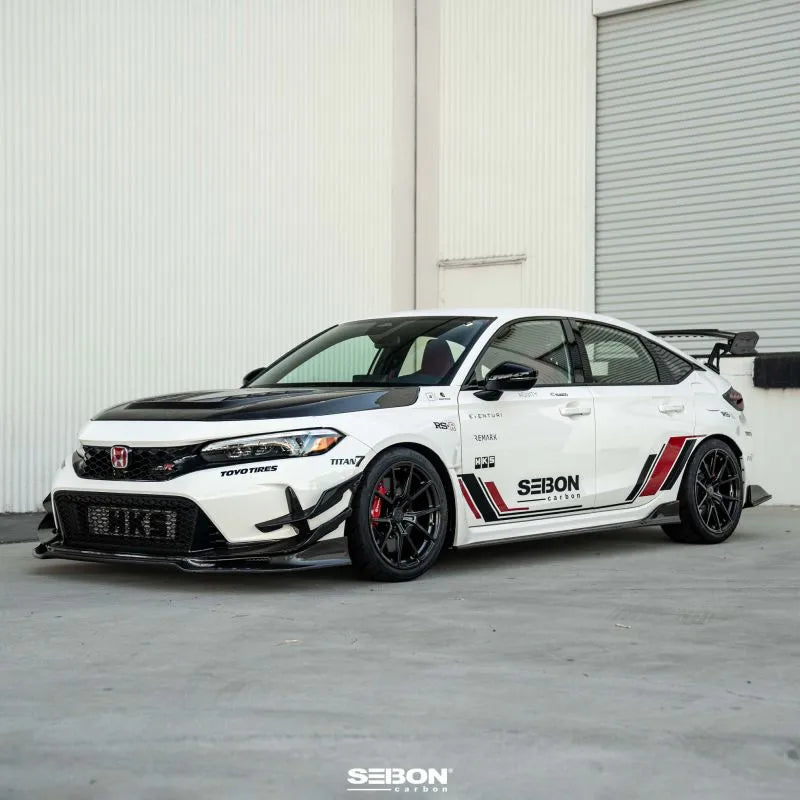 Seibon carbon fiber front bumper canards installed on Honda Civic, showing gloss finish detail (9)
