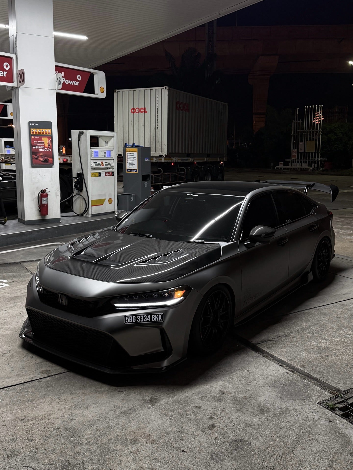 Carbon fiber hood with louvers on 2023+ Honda Civic Type R FL5, front-angle view