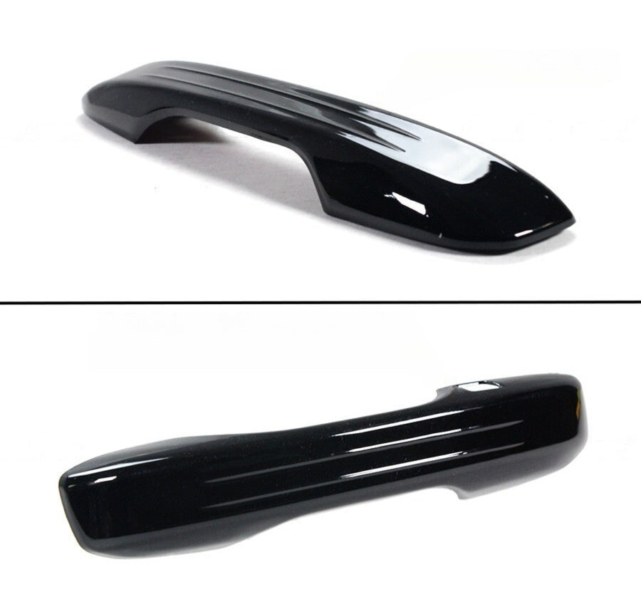 Gloss black Acura Integra door handle cover trim shown in side and three-quarter views