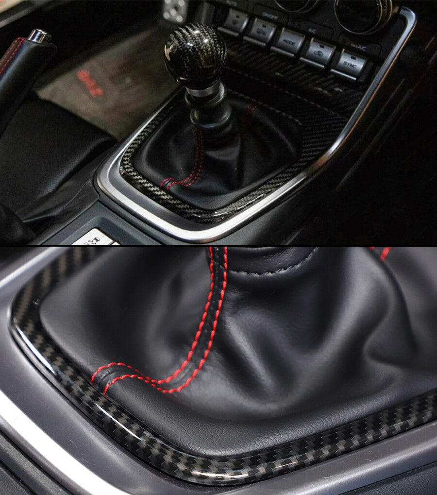 Carbon fiber gear shift console trim with glossy 3K weave finish installed on Toyota GR86 interior (2)