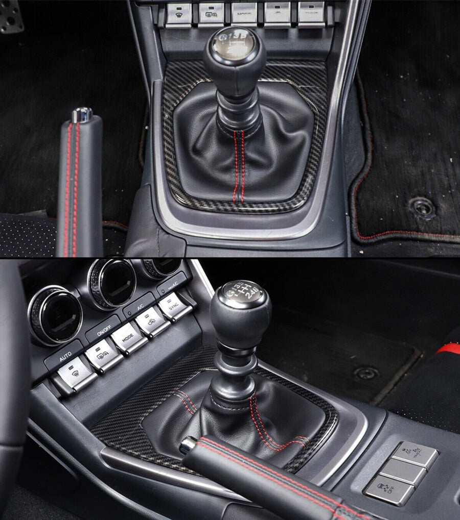 Carbon fiber gear shift console trim with glossy 3K weave finish installed on Toyota GR86 interior (1)