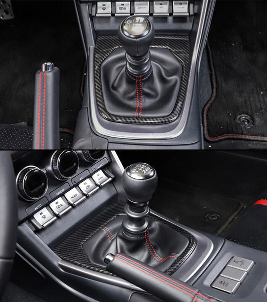 Carbon fiber gear shift console trim with glossy 3K weave finish installed on Toyota GR86 interior (1)